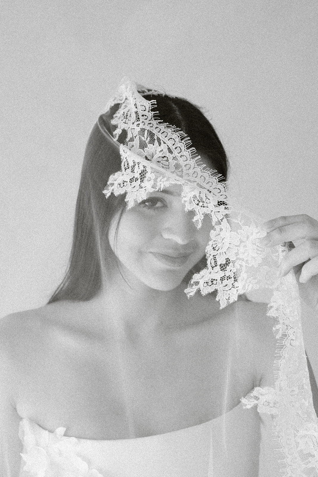 Luxury mantilla wedding veil with authentic French leavers lace bride portrait