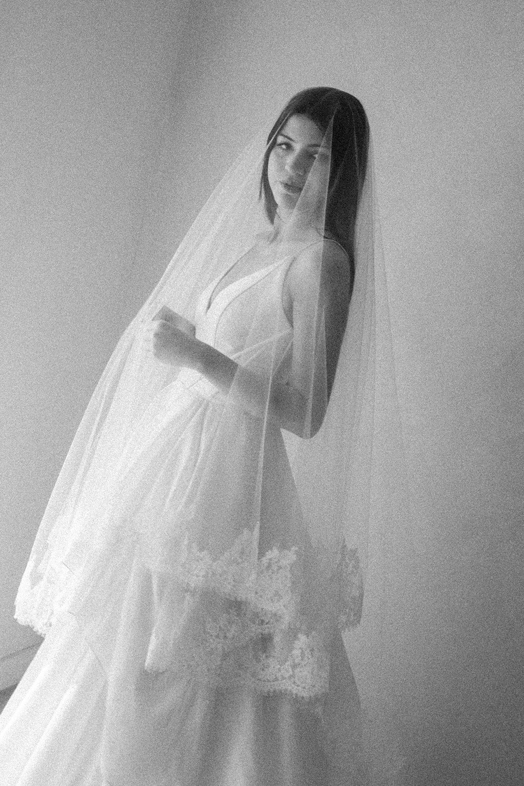 Luxury mantilla wedding veil with authentic French Leavers lace editorial