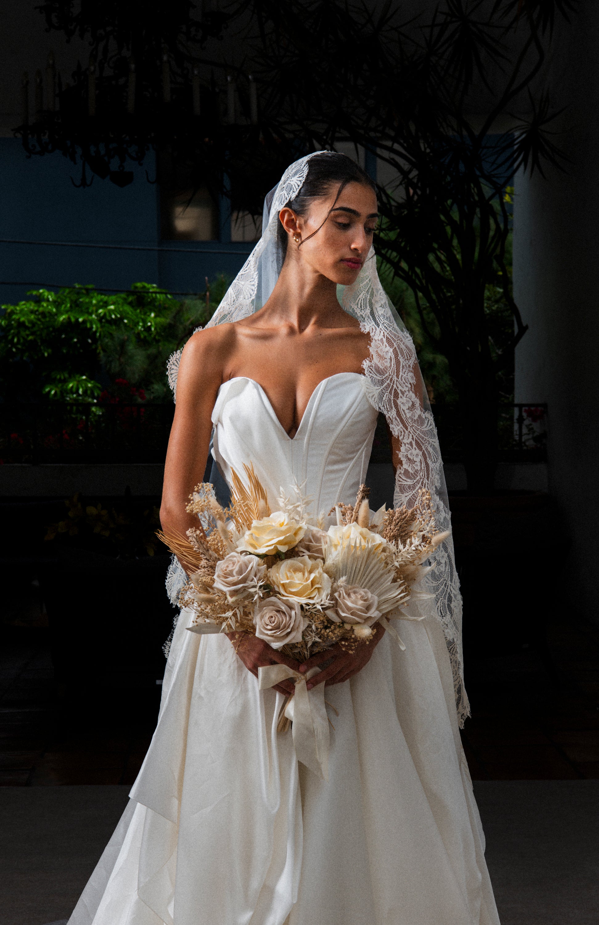 Clair de Lune cathedral veil natural drape showing lace pattern on bride wearing Carol Hannah ivory Senara wedding dress