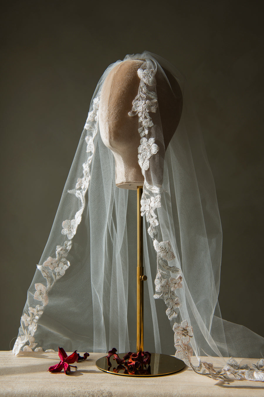 Side view of Primevère embroidered veil with shadow play on flowers