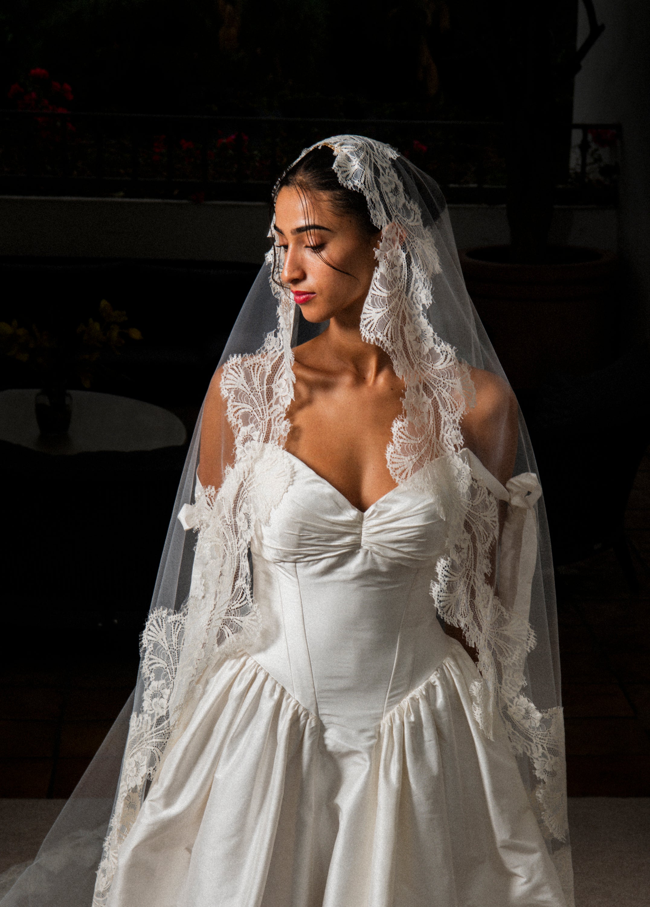 Clair de Lune French lace mantilla veil on bride, side profile view, paired with vintage ivory Rebecca Schoneveld Bree wedding dress